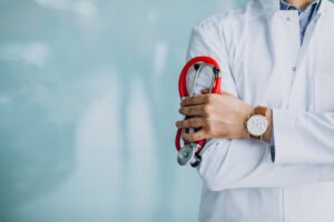 Doctor holding a stethoscope representing Medicare healthcare coverage in Florida for seniors and retirees